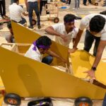 Formula 1 car race team building